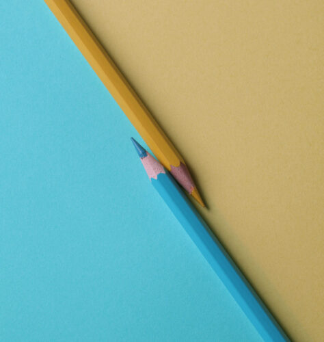 Yellow and blue colored pencils