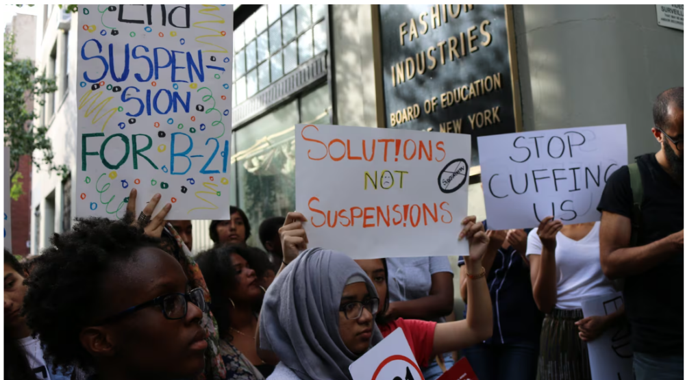 Suspensions spiked in New York City last year. Students and advocates, pictured here in 2016, protest the city's suspension policies.