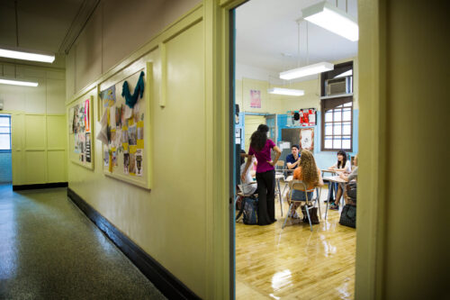 View into a classroom from a school hallway.