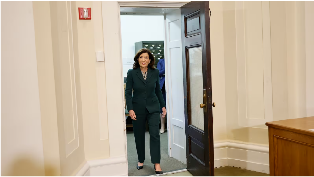 Gov. Kathy Hochul arrives for a press conference signing legislation creating a commission for the study of reparations in New York on Dec. 19, 2023. On Tuesday, Hochul unveiled her budget proposals, including her support for mayoral control in NYC.