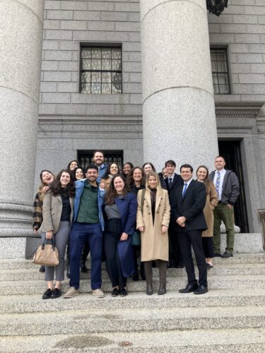 AFC staff and lawyers on the steps of the NYC courthouse