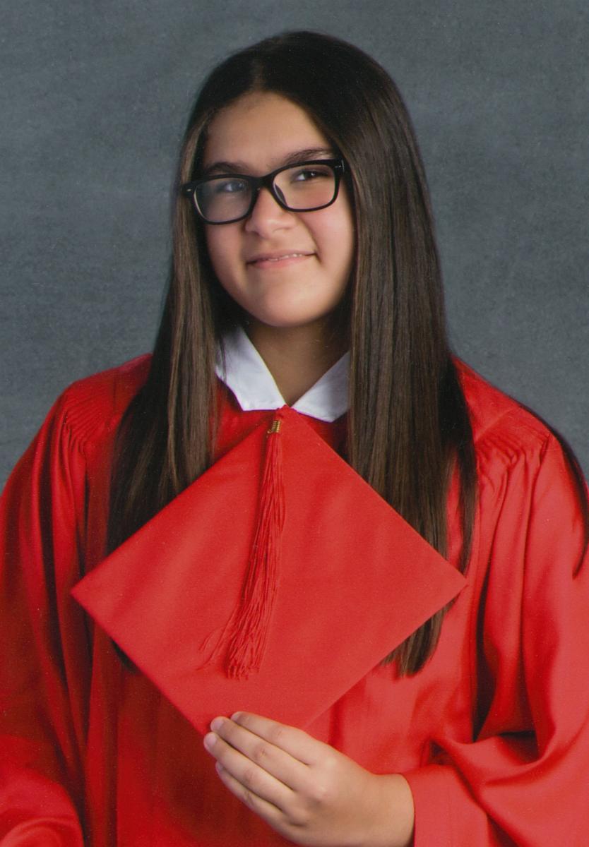 Mishel in cap and gown