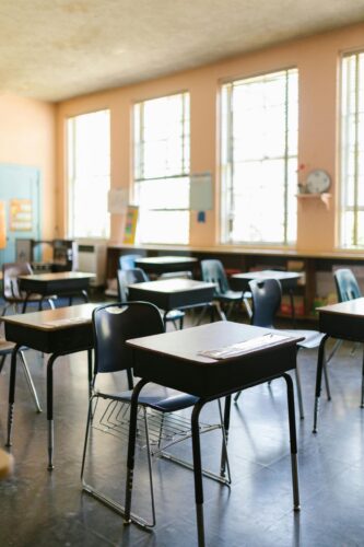 Desks in an empty classroom