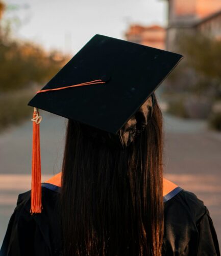 Student wearing a class of 2020 mortarboard, viewed from behind.