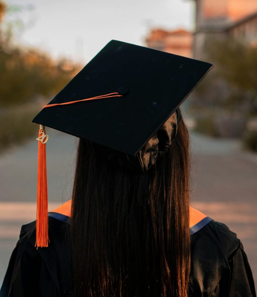 Student wearing a class of 2020 mortarboard, viewed from behind.